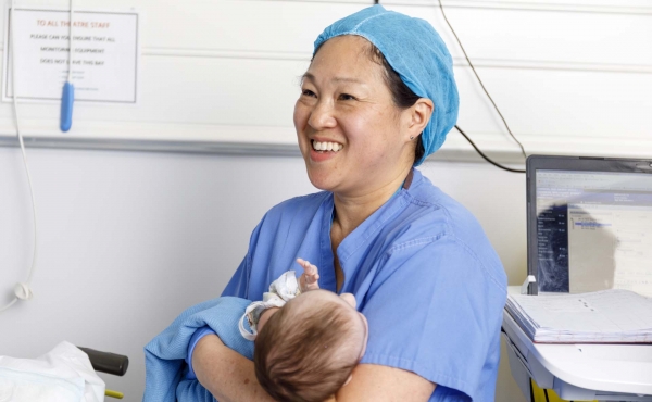 Anaesthetist with baby