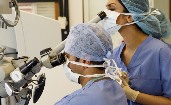 Doctors with theatre equipment