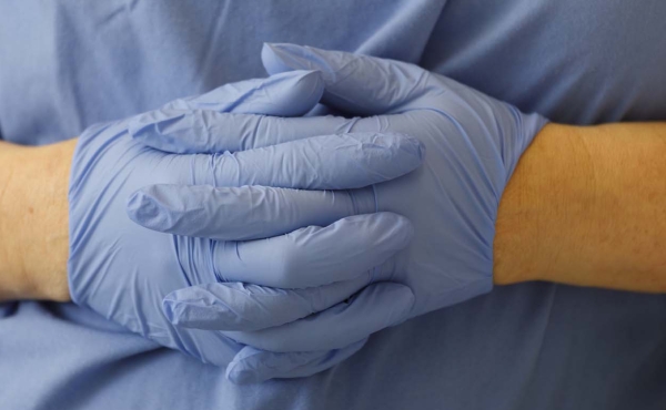 Gloved hands