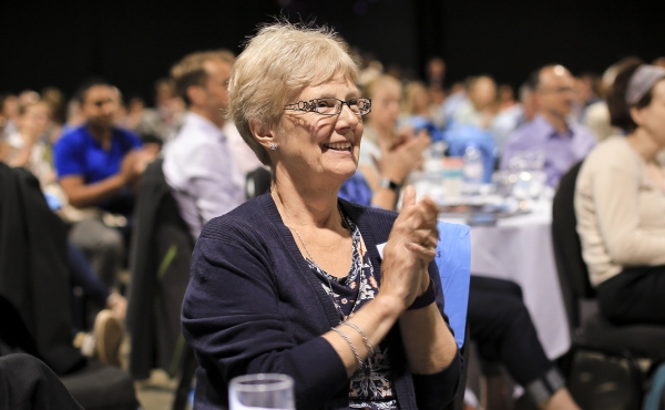 Delegate clapping at conference