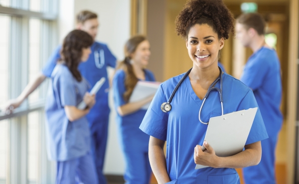 Trainee doctor with clipboard