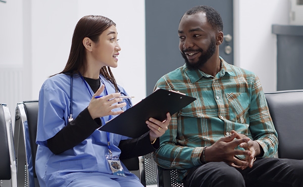 Doctor speaking to a patient