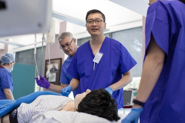 Two doctors and sim person